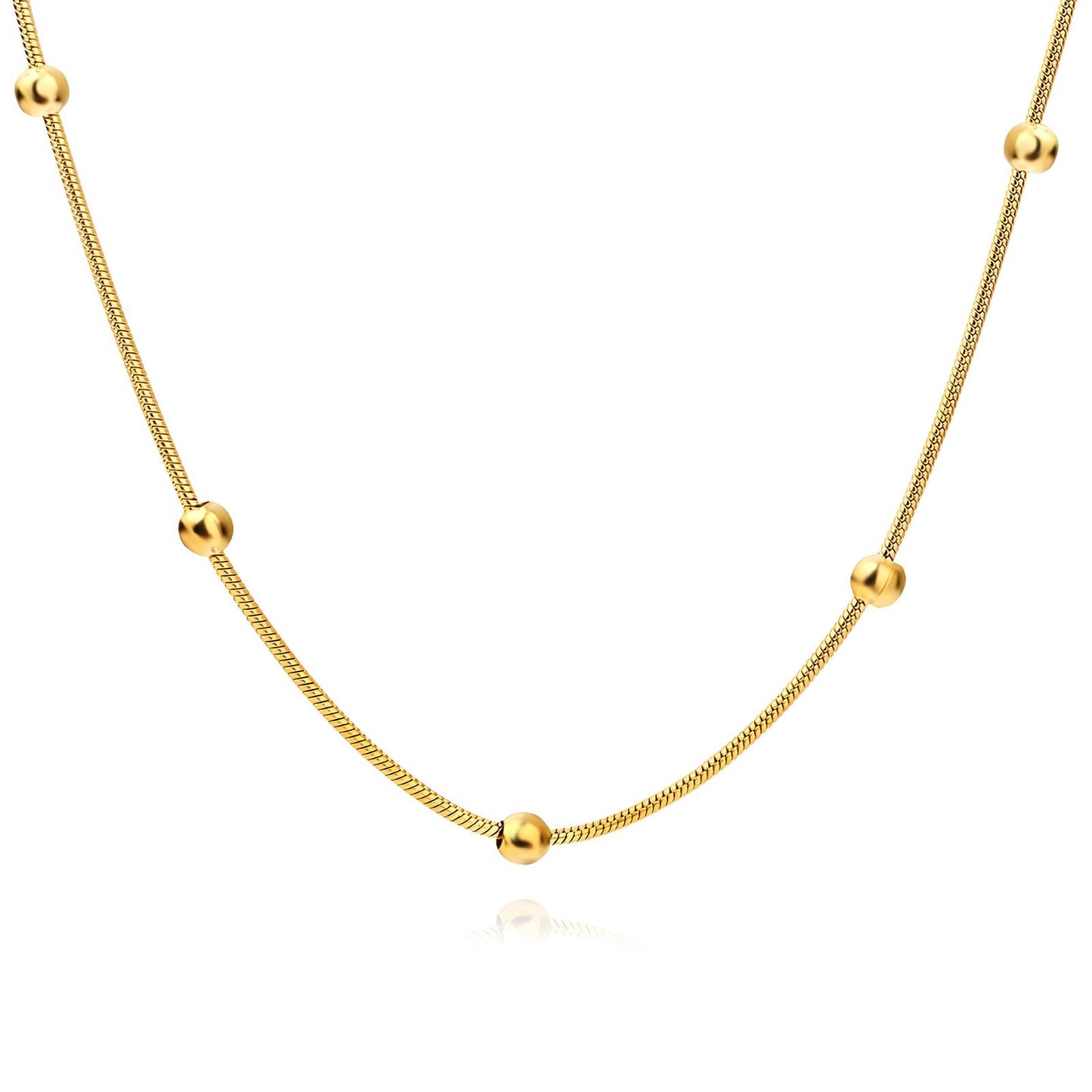 Gold snake chain necklace with spaced beaded accents, made from stainless steel with 18K gold PVD plating, waterproof and hypoallergenic.