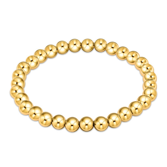 Gold beaded stretch bracelet made from stainless steel with 18K PVD gold plating, waterproof, hypoallergenic, and tarnish-resistant design.