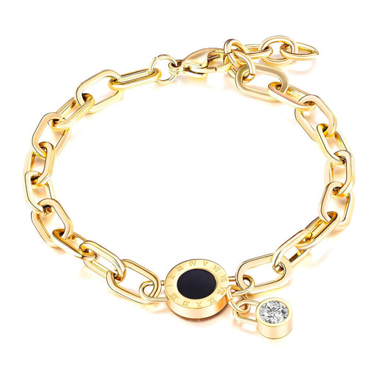 Gold chain bracelet with Roman numeral charm and cubic zirconia accent, made from stainless steel with 18K gold PVD plating, waterproof and hypoallergenic.