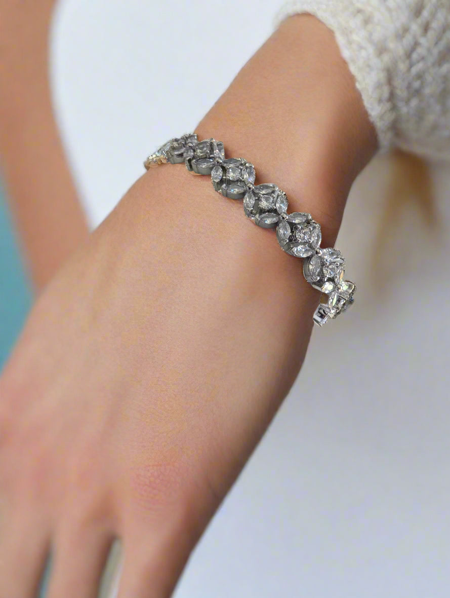 Silver plated flower zircon bracelet with clear crystal stones, adjustable chain design – perfect for bridal or special occasion wear